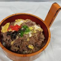 Gyudon · Beef with egg over rice with special sauce and miso soup.