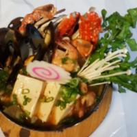 Seafood Broth · Fresh seafood casserole with assorted vegetable in spicy broth.