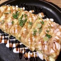 Japanese-style Omelet with Cheese · egg omlet filled in american cheese and sauce.