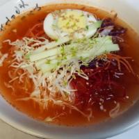 Cold Jjoly Myun · Cold soup inside korean chewy noodle with vegitables and boiled egg. Spicy
