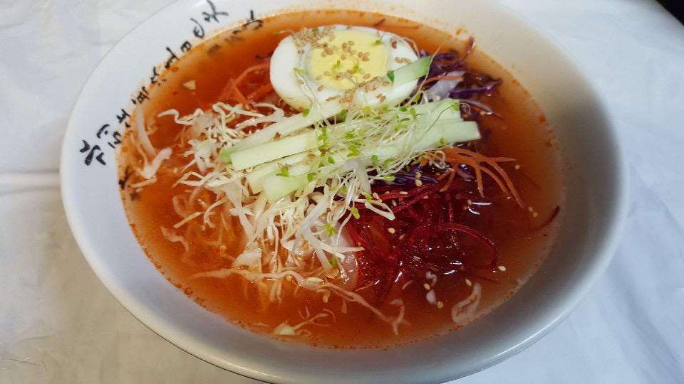 Cold Jjoly Myun · Cold soup inside korean chewy noodle with vegitables and boiled egg. Spicy