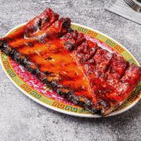 Barbeque Spare Ribs · A cut of meat from the bottom section of the ribs. Ribs that have been broiled, roasted, or ...