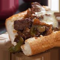 Cheesesteak Sandwich · Steak, cheese, and caramelized onion sandwich. 