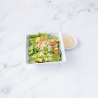 Caesar Salad · Romaine mix, Asiago cheese and croutons with Caesar dressing.