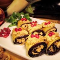 Eggplant with Walnuts · Eggplant spread with nuts, pomegranates, herbs and onions.
