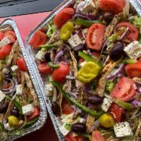 Greek  Chicken Salad · Charbroiled chicken breast  Lettuce, tomatoes, onions, green-peppers, feta cheese, Greek oli...