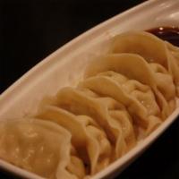 Steamed Gyoza · 6 pieces. Chicken filling