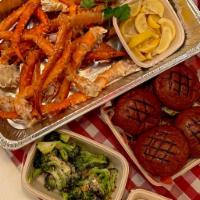 Crab Cellar Family Meal Kit for 4 People · 4lbs king crab legs, 4 prime burgers, mac & cheese, roasted broccoli, hush puppies, boardwal...