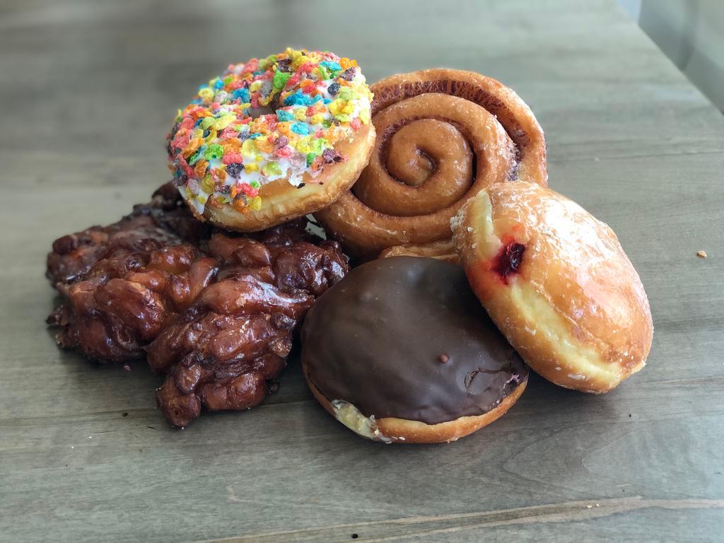 Specialty Donut Dozen · Any 12 specialty donuts. If you would like multiples of a specific flavor, please indicate the amount of each in the special instructions.