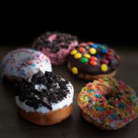 Mix and Match Dozen · Any 6 classic, 3 specialty with topping, and 3 big donuts. If you would like multiples of a ...