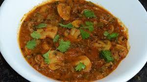 Karahi Mushroom · Fresh mushrooms cooked with chopped onions, tomatoes and spices.
