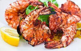 Prawn Tandoori · Jumbo prawns marinated in yogurt and spices then roasted in the clay oven. Cooked on charcoa...
