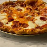 New York-Style Pizza · San Marzano tomato sauce, mozzarella cheese, choice of pepperoni or veggies.