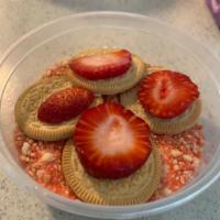 Strawberry Shortcake Pudding · Homemade pudding
Golden Oreos
Fresh strawberries 
Strawberry shortcake crumble

(1) 8oz cups...