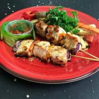 Grilled Protein Kebabs · Deliciously grilled kebabs of your favorite protein with a side of White rice or roasted pot...