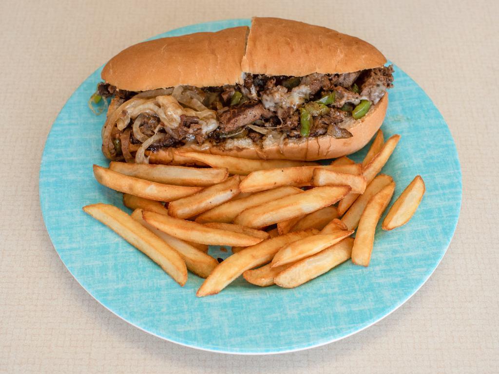 Philly Cheese Steak · Grilled ribeye steak with onion and bell peppers and cheese, choice of pita or sub roll.