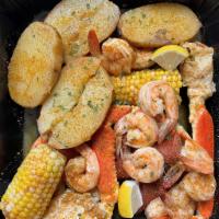 B2. Seafood Bowl · 1 snow crab, 10 pieces large shrimp, 2 sausage, 2 corns and 2 potatoes.