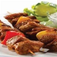Beef tekah  	 · Marinated beef or lamb. Served with rice, salad & pita bread. 
