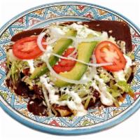 Enchiladas de Mole · Red sauce. 4 corn tortillas filled with mozzarella cheese and chicken prepared with lettuce,...