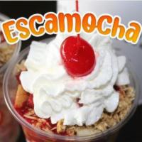 Escamocha · Pear, apple, banana, cantaloupe, granola, condensed milk, strawberry juice, and whipped crea...