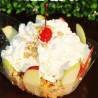 Fruit Salad with Ice Cream · Pear, apple, banana, cantaloupe, granola, condensed milk, and whipped cream with ice cream.