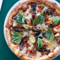2 Mediterranean Pizzas · Grilled eggplant, artichoke heart, sun dried tomato, fresh basil, crumbled feta, mozzarella ...