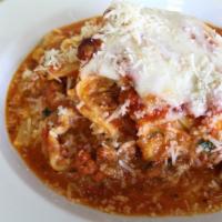 Lasagna Paste · Homemade tomato meat sauce, ricotta, Parmesan and baked mozzarella.
