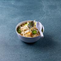 Traditional Vietnamese Pho · A combination of beef and chicken stock served with fresh rice noodles, accompanied with bea...