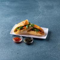 Shredded Chicken Sandwich · Served with pickled carrots and daikon, cucumber, cilantro, jalapeno, soy sauce, black peppe...