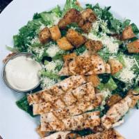 Chicken Caesar Salad · Romaine lettuce, Parmesan cheese, garlic croutons. Add protein for an additional charge.