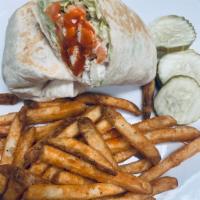 Buffalo crispy chicken wrap · Chicken tenders toss with buffalo sauce, lettuce, tomato, blue cheese crumbles ,ranch dressi...