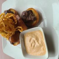 Tender Sliders · . 3 prime angus beef with, red wine braised onions, auju , horse chipotle cream sauce, and c...