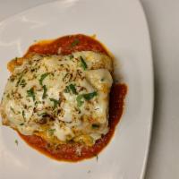 meat lasagna  · meat  lasagna with marinara sauce, spinach lasagna served with marinara sauce or eggplant pa...