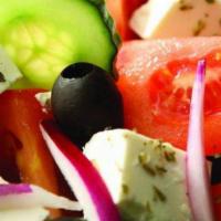 Greek Salad · Mixed greens, cucumbers, tomatoes, peppers, onions, olives, and feta cheese.