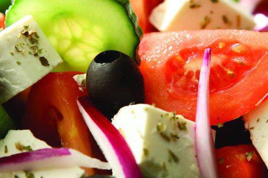 Greek Salad · Mixed greens, cucumbers, tomatoes, peppers, onions, olives, and feta cheese.