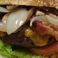 The B.O.M. Cheese Burger · Half a pound of angus beef char-grilled with American cheese and topped with bacon, grilled ...