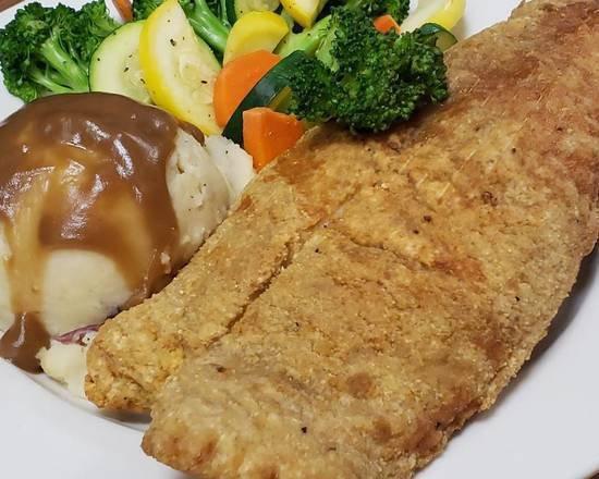 Blackened Grouper Dinner · Served with mashed potatoes and mixed vegetables.