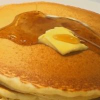 Pancakes · Three Buttermilk Pancakes served with butter and syrup