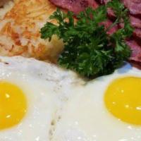 Classic Breakfast Platter · Two eggs any style served with hashbrowns ＆ choice of bacon or sausage.