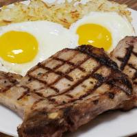 Grilled Pork Chops ＆ Eggs · 2 Center Cut 8oz Pork Chops grilled served with 2 eggs any style and hashbrowns.
