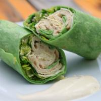Chicken Caesar Wrap · Our spin on the classic chicken caesar wrap --- chicken, greens, and parmesan packed into a ...