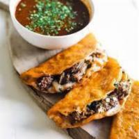 Birria Tacos · 3 pieces. Authentic Jalisco-style birria (braised beef) and cheese quesadilla topped with so...