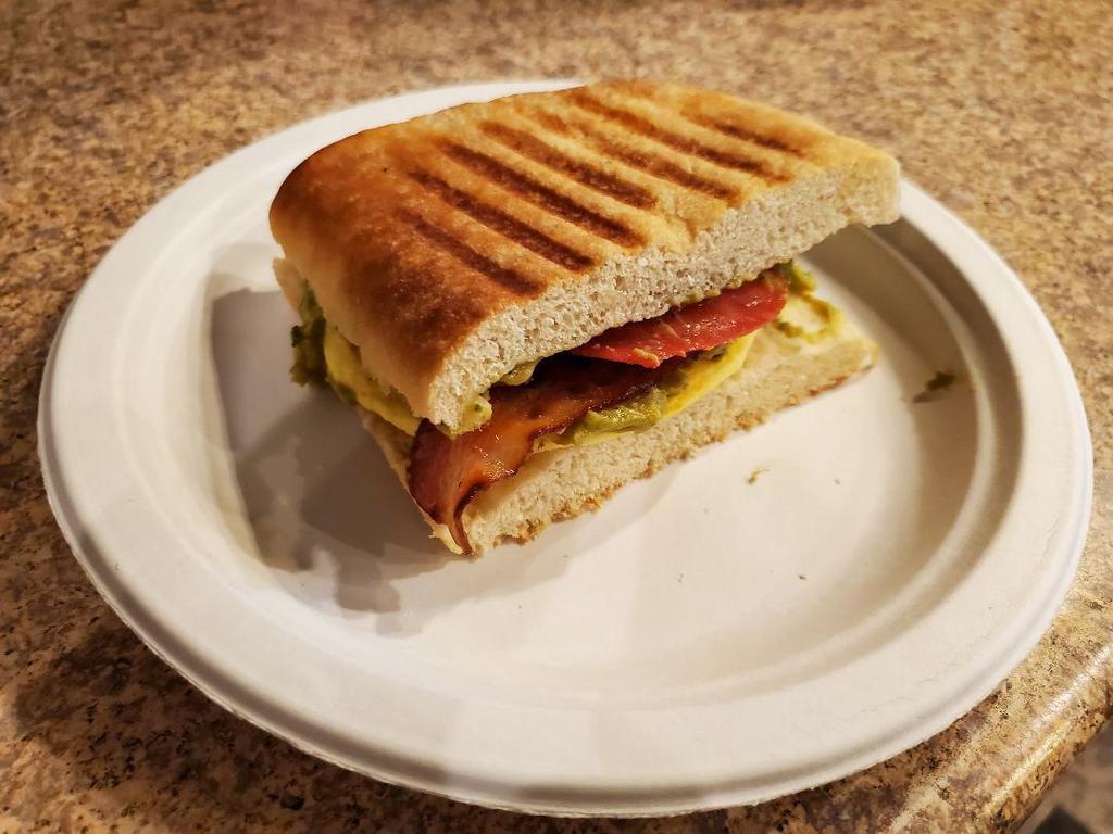 Guaca Morning Sandwich · Bacon, egg, tomato, and guacamole on ciabatta bread