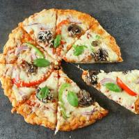 Veggie Pizza · Tomato sauce, mozzarella cheese, onion, mushroom, black olive, and green pepper.