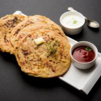 Plain Naan · All purpose flour cooked in clay oven.