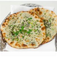 Onion Kulcha · Stuffed with spiced onions and herbs.