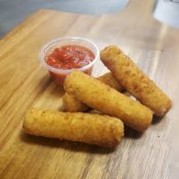 Mozzarella Sticks · Sliced mozzarella freshly breaded served with marinara.