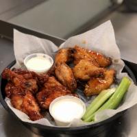 Traditional Chicken Wings · All wings served with ranch or blue cheese and celery.