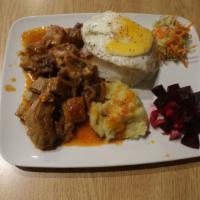 Ragu · Fried lamb ribs. Lamb's ribs served with steamed rice and an egg with 2 small salad servings. 