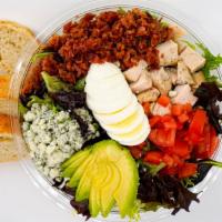 Cobb Salad · Chopped romaine and spring mix, cherry tomatoes, crisp bacon, sliced egg, avocado, grilled c...